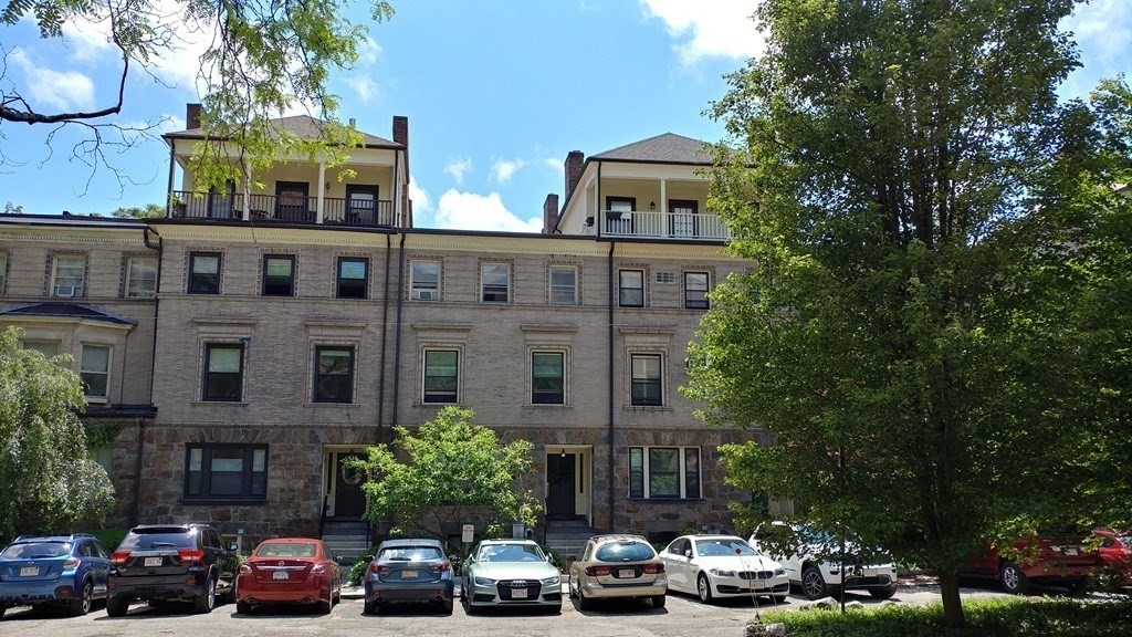 9 Regent Circle, Unit 3 Brookline, MA 02445 - Photo 17 of 20 a front view of a building with street view