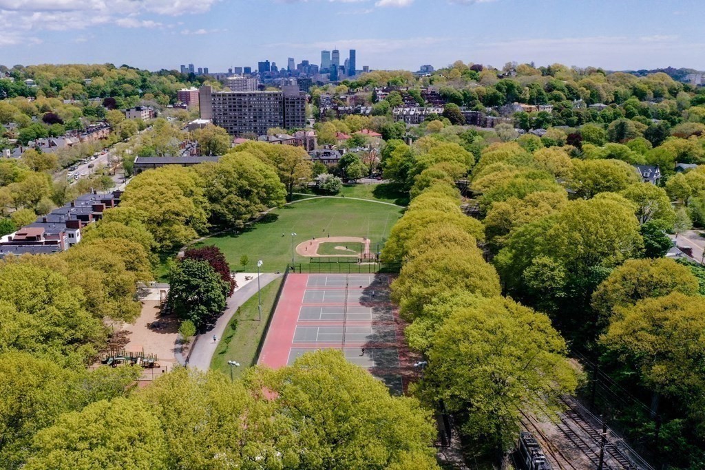 9 Regent Circle, Unit 3 Brookline, MA 02445 - Photo 20 of 20 an aerial view of a house with a yard and lake view