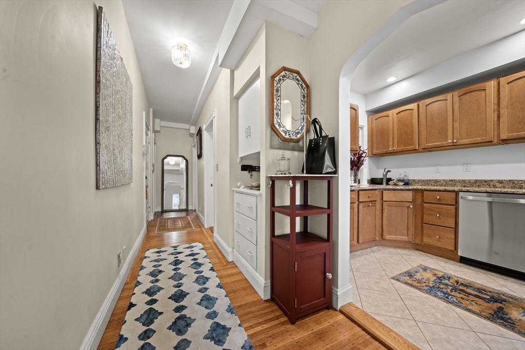 9 Regent Circle, Unit 3 Brookline, MA 02445 - Photo 6 of 20 a view of a kitchen with cabinets