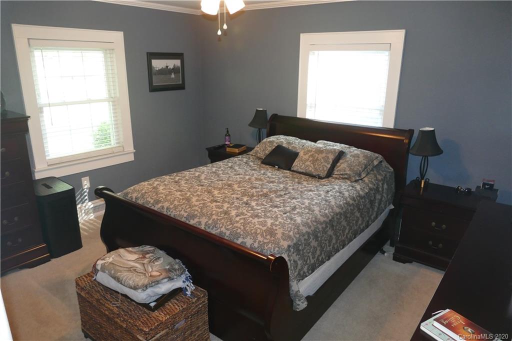 5901 Cress Road Concord, NC 28025 - Photo 14 of 27 a bedroom with a bed and a window