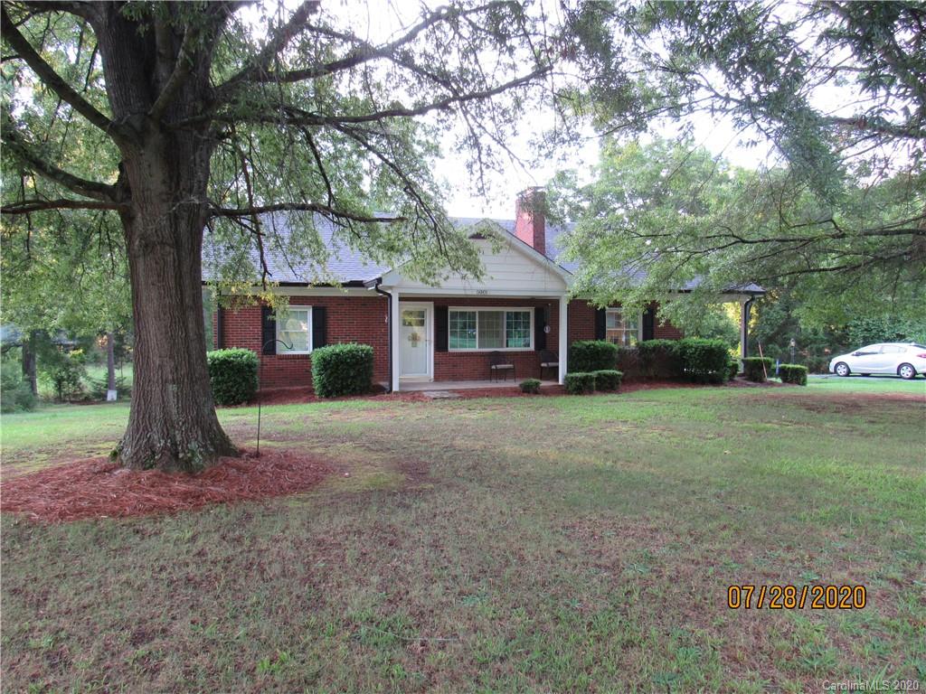 5901 Cress Road Concord, NC 28025 - Photo 5 of 27 a view of a house with a tree in front of a yard
