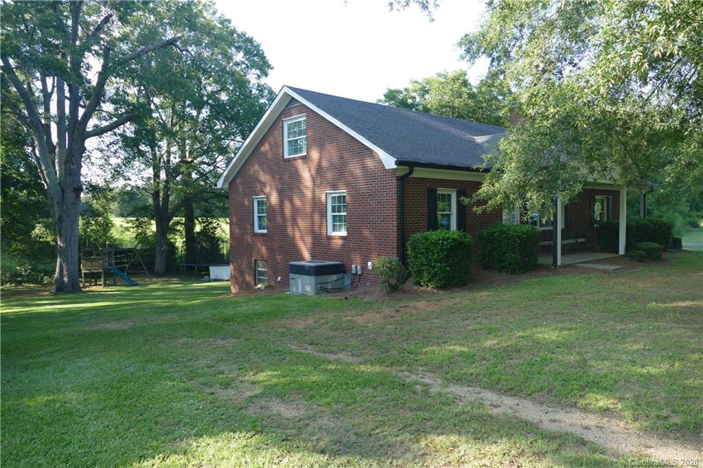 5901 Cress Road Concord, NC 28025 - Photo 8 of 27 a view of a house with a yard