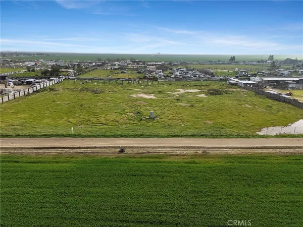 a view of a city with a big pool