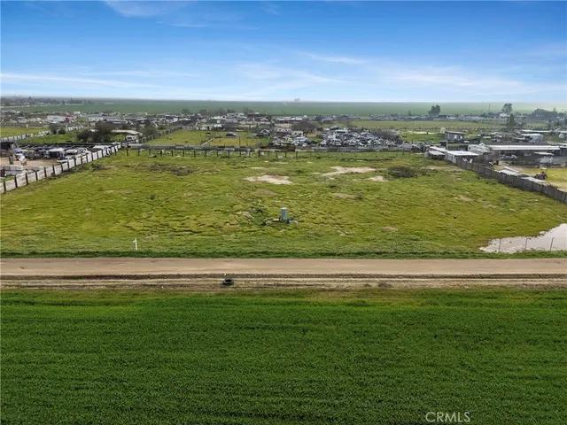 a view of a city with a big pool