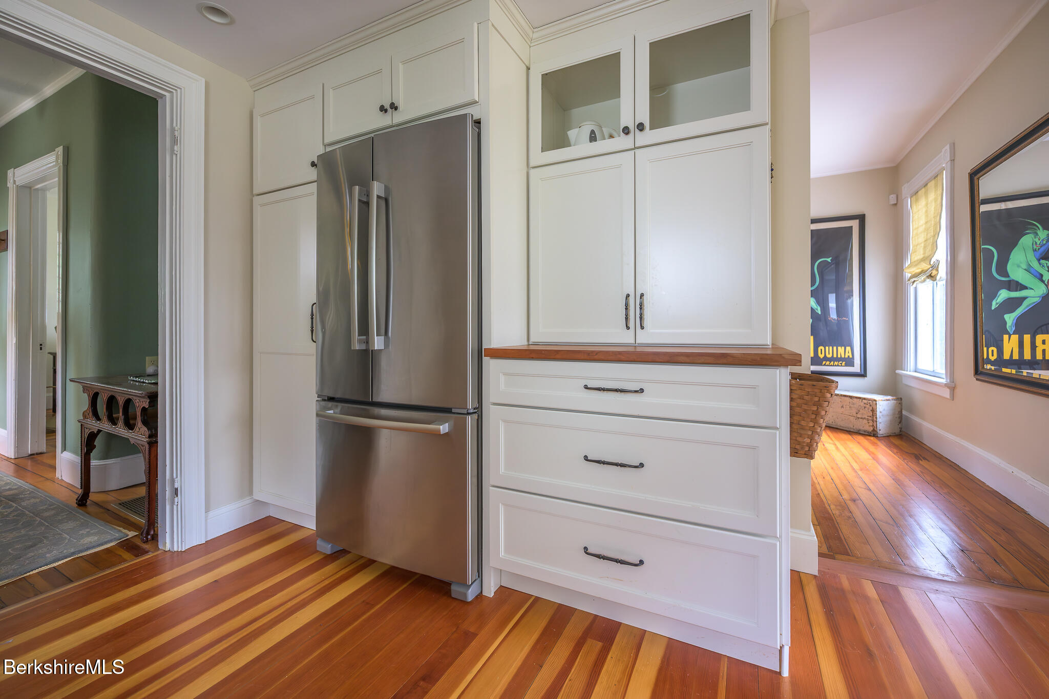 11 Sergeant Street Stockbridge, MA 01262 - Photo 12 of 52 a kitchen with a refrigerator and a wooden floor
