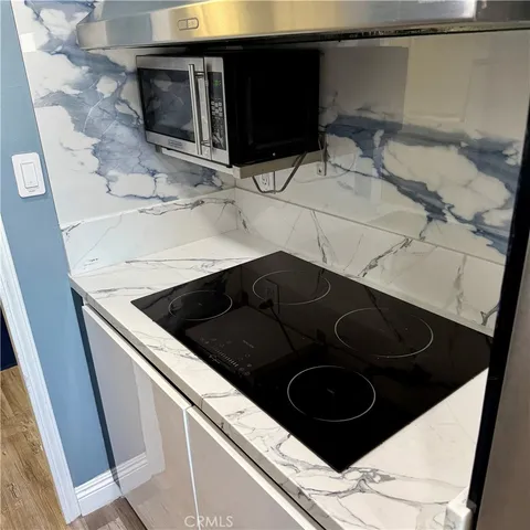 a close view of stove top oven and microwave