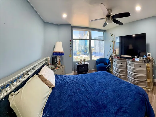 a bathroom with a glass door shower