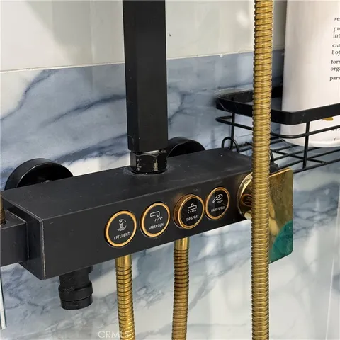 a living room with furniture and flowers