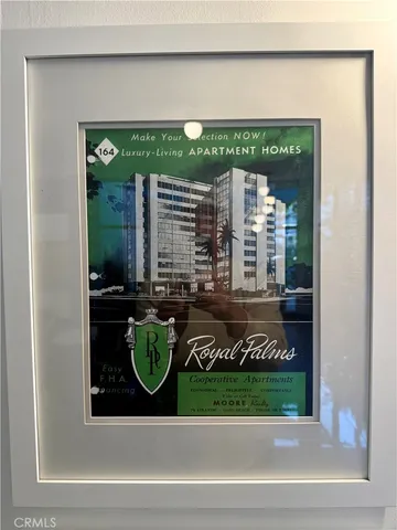 a view of a street with tall buildings