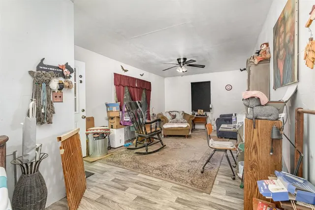 a view of a livingroom with furniture and a livingroom