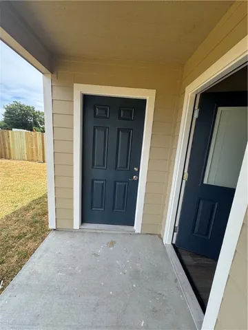 a view of a back yard of the house