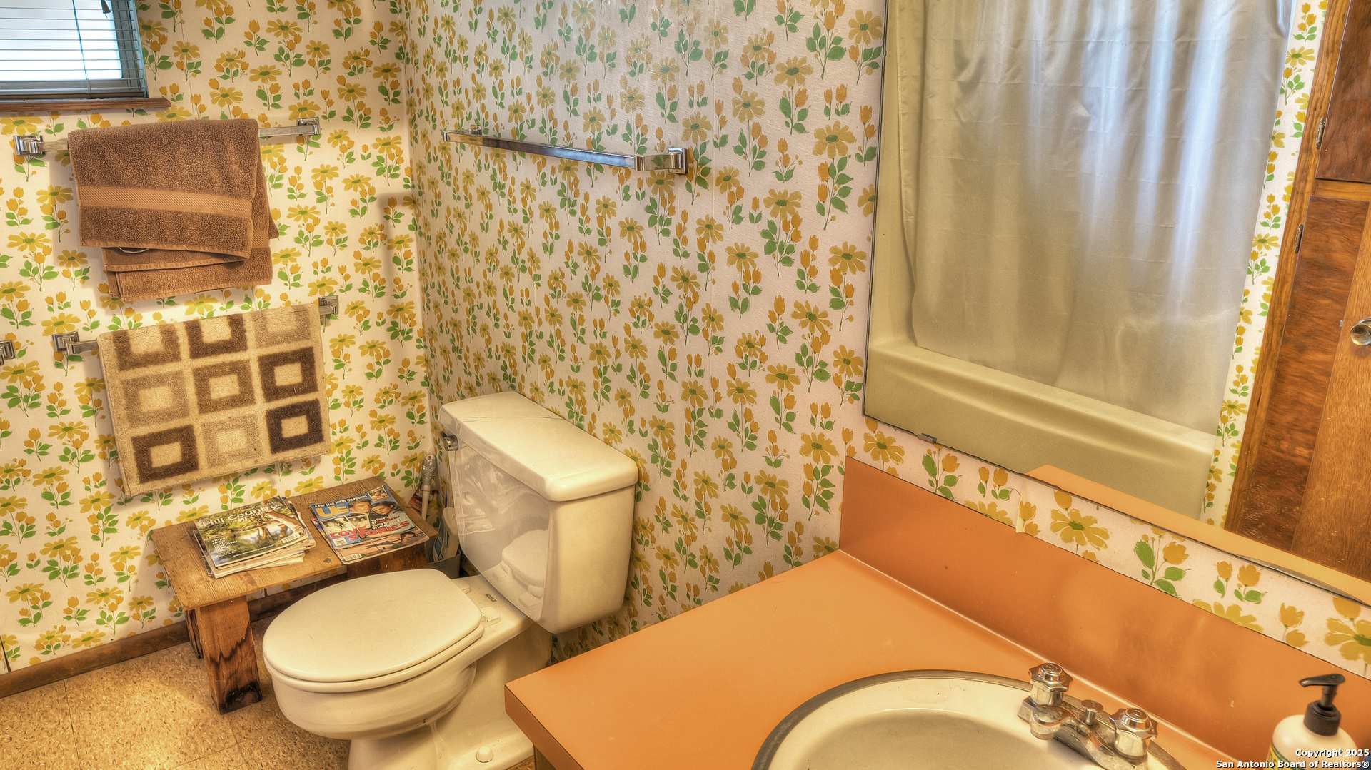 154 Weston Road Leakey, TX 78873 - Photo 27 of 39 a bathroom with a toilet and a shower curtain