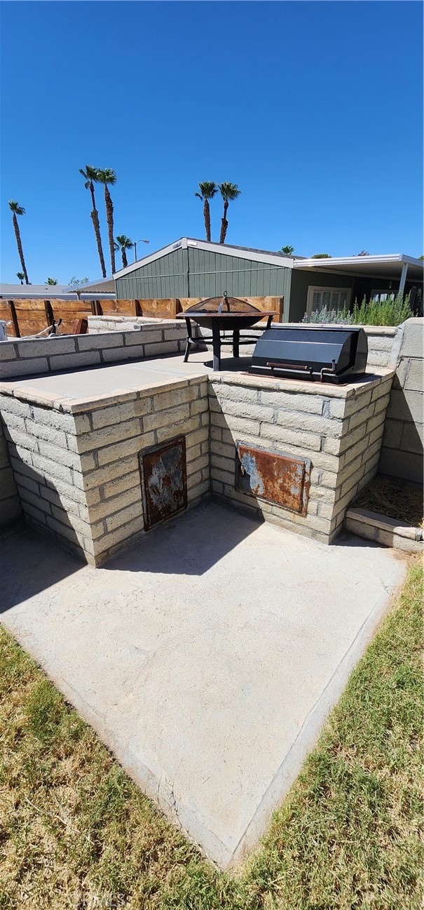 3589 West Wells Road, Unit 99 Blythe, CA 92225 - Photo 17 of 27 a view of a swimming pool with a chair