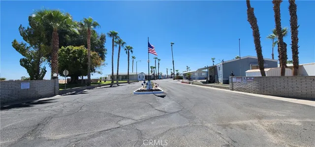 a view of a lake with tall buildings