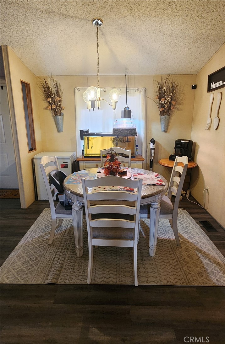 3589 West Wells Road, Unit 99 Blythe, CA 92225 - Photo 6 of 27 a view of a dining room with furniture