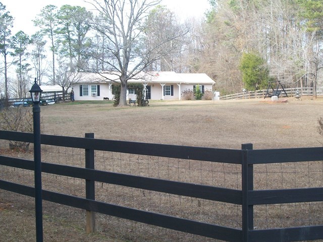 168 Liberty Ridge Drive Gray, GA 31032 - Photo 1 of 22 a front view of a house with a yard