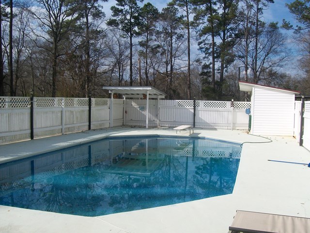 168 Liberty Ridge Drive Gray, GA 31032 - Photo 15 of 22 a view of backyard with large trees