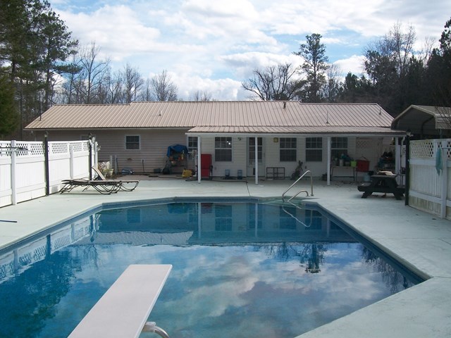 168 Liberty Ridge Drive Gray, GA 31032 - Photo 16 of 22 a view of a house with pool
