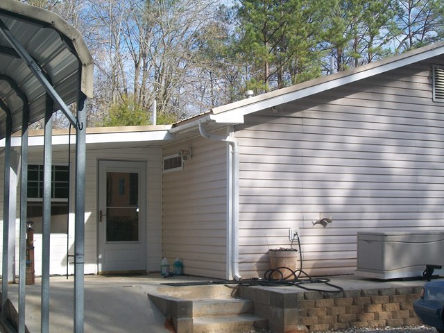 168 Liberty Ridge Drive Gray, GA 31032 - Photo 19 of 22 a side view of a house with street