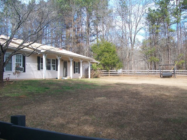 168 Liberty Ridge Drive Gray, GA 31032 - Photo 22 of 22 a view of a house with a backyard