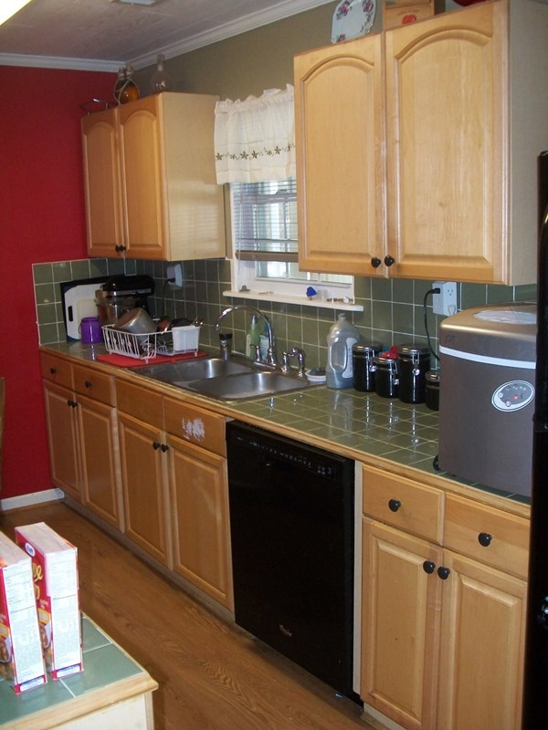 168 Liberty Ridge Drive Gray, GA 31032 - Photo 5 of 22 a kitchen with stainless steel appliances granite countertop a sink a stove and cabinets