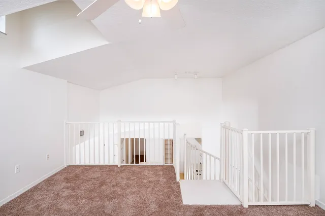 a view of a hallway with closet