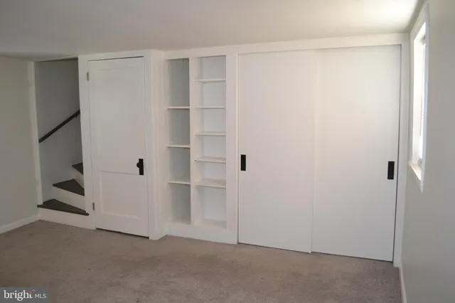 a view of closet area with window