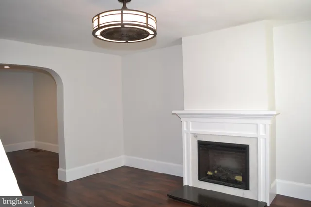 a view of a livingroom with a fireplace