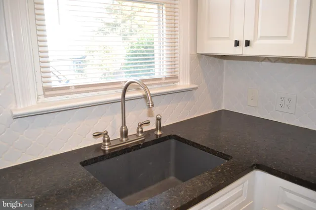 a view of washer and dryer in a utility room