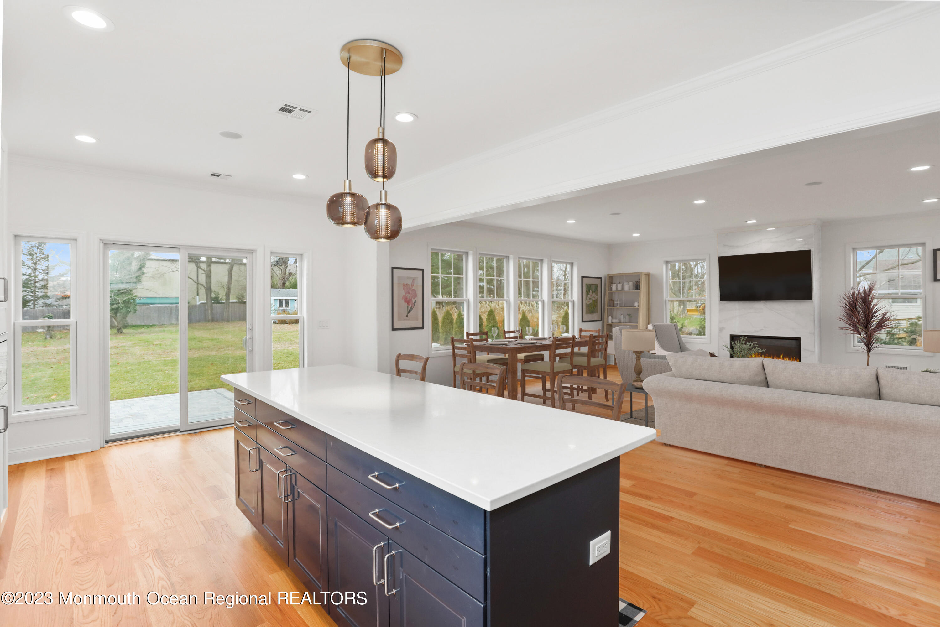2223 Old Mill Road Spring Lake Heights, NJ 07762 - Photo 17 of 74 a large living room with stainless steel appliances granite countertop furniture and a large window