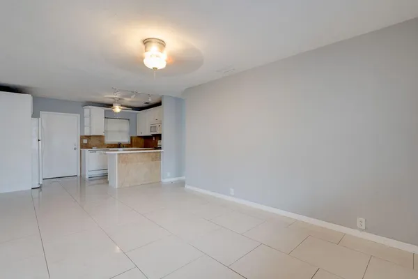 a view of kitchen with wooden floor