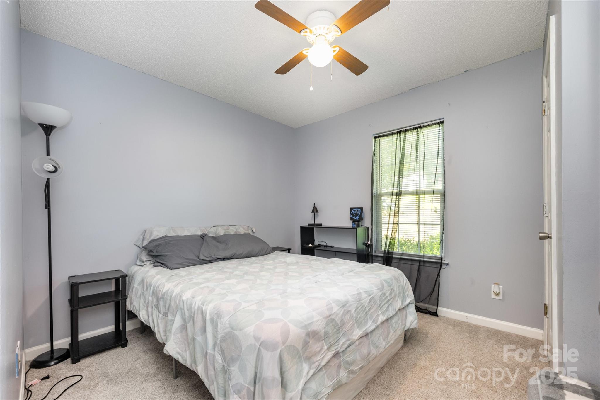 704 Willow Road Salisbury, NC 28147 - Photo 11 of 18 a bedroom with a bed and a window