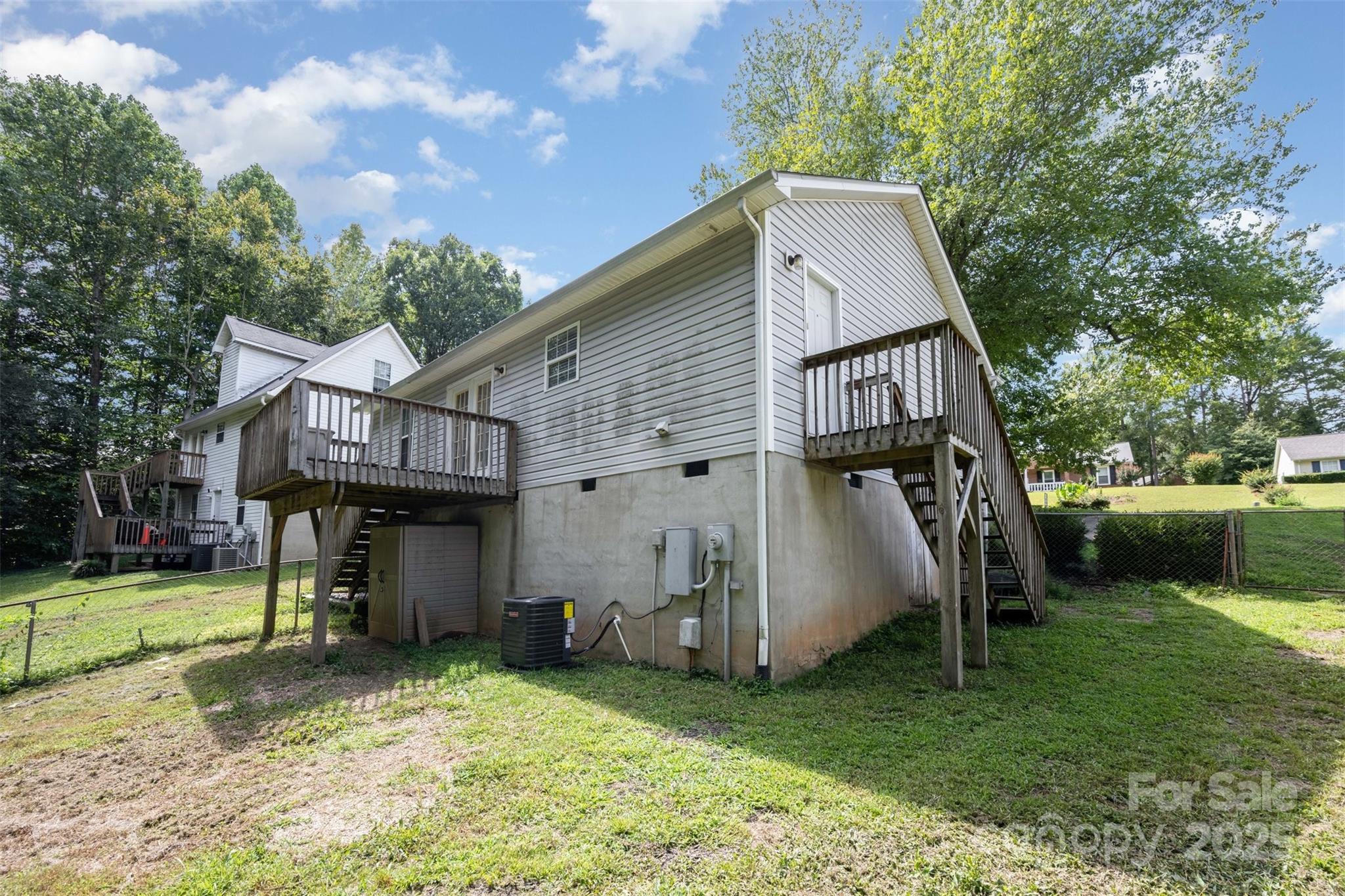 704 Willow Road Salisbury, NC 28147 - Photo 16 of 18 a view of a house with a yard