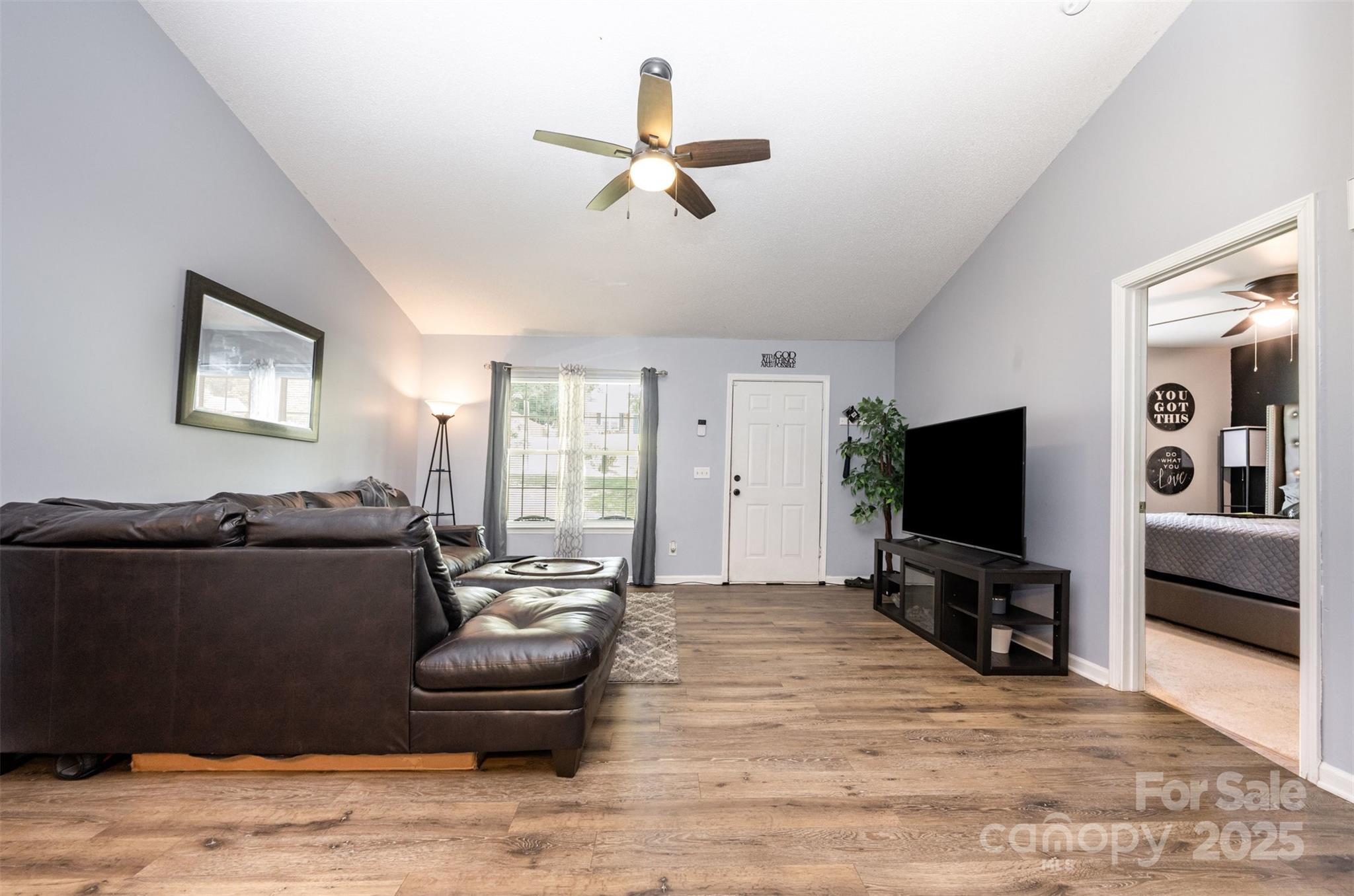 704 Willow Road Salisbury, NC 28147 - Photo 6 of 18 a living room with furniture and a flat screen tv