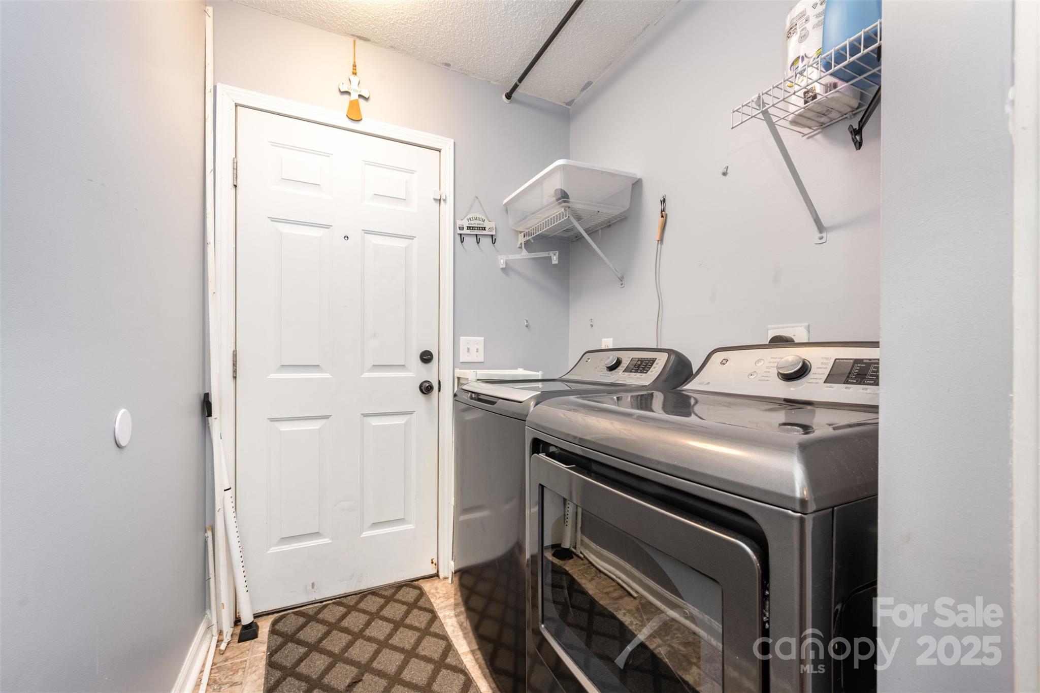 704 Willow Road Salisbury, NC 28147 - Photo 9 of 18 a utility room with dryer and washer