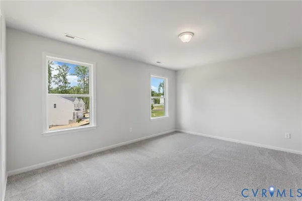 an empty room with windows