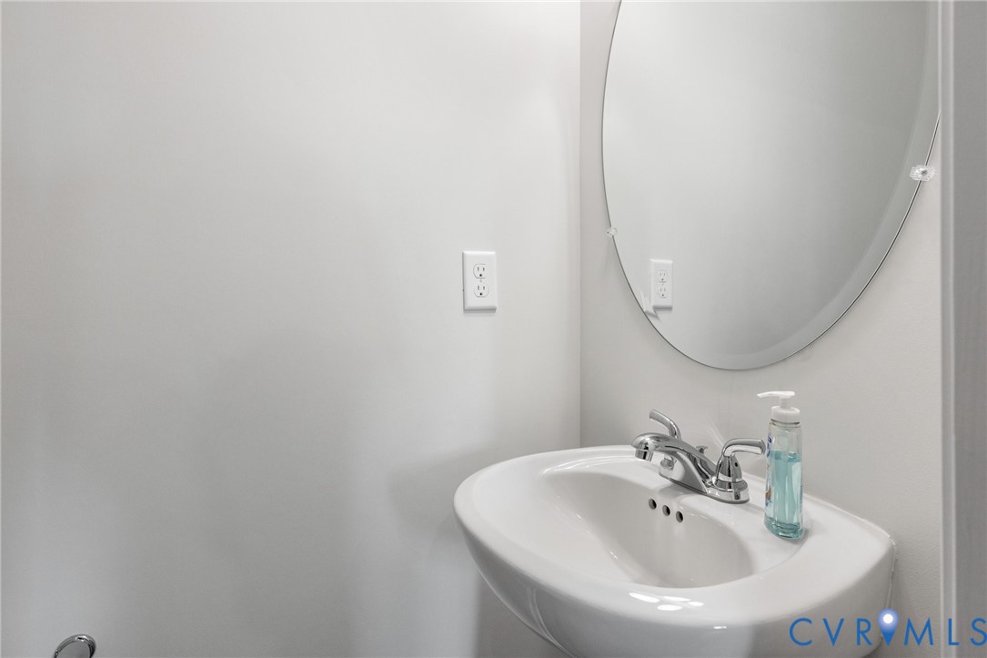137 Bellevue Terrace Aylett, VA 23009 - Photo 15 of 24 a bathroom with a sink and a mirror