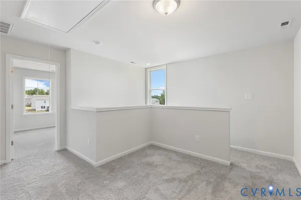 an empty room with windows