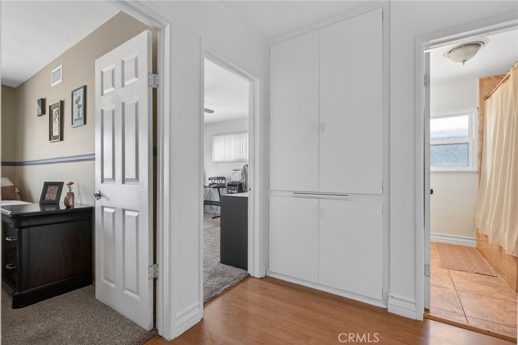 4194 Euclid Court Riverside, CA 92504 - Photo 21 of 29 From the hallway, you can get a peek into two of the bedrooms and the hallway bathroom.