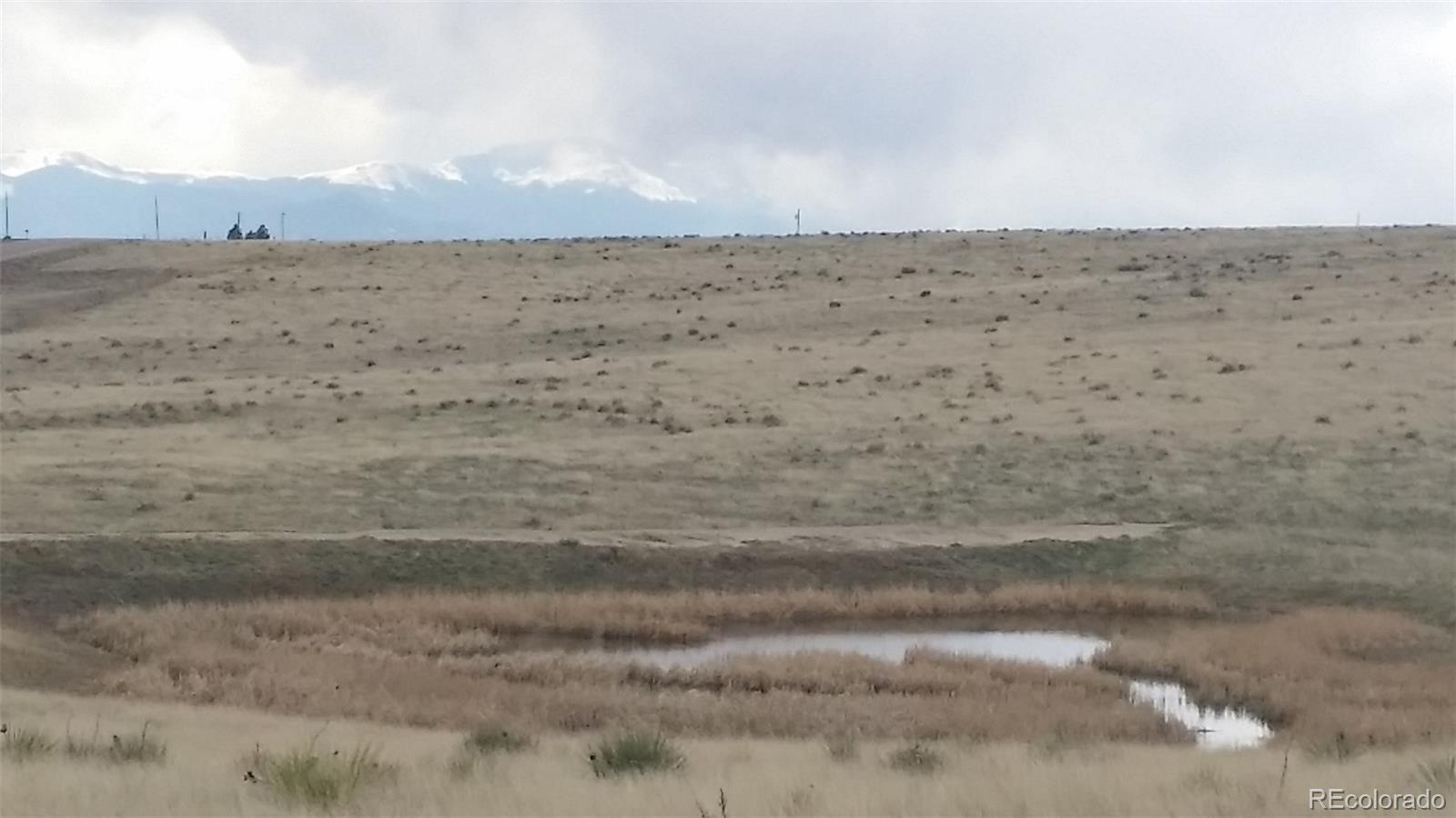 25800 Judge Orr Road Calhan, CO 80808 - Photo 7 of 18 a view of beach and lake