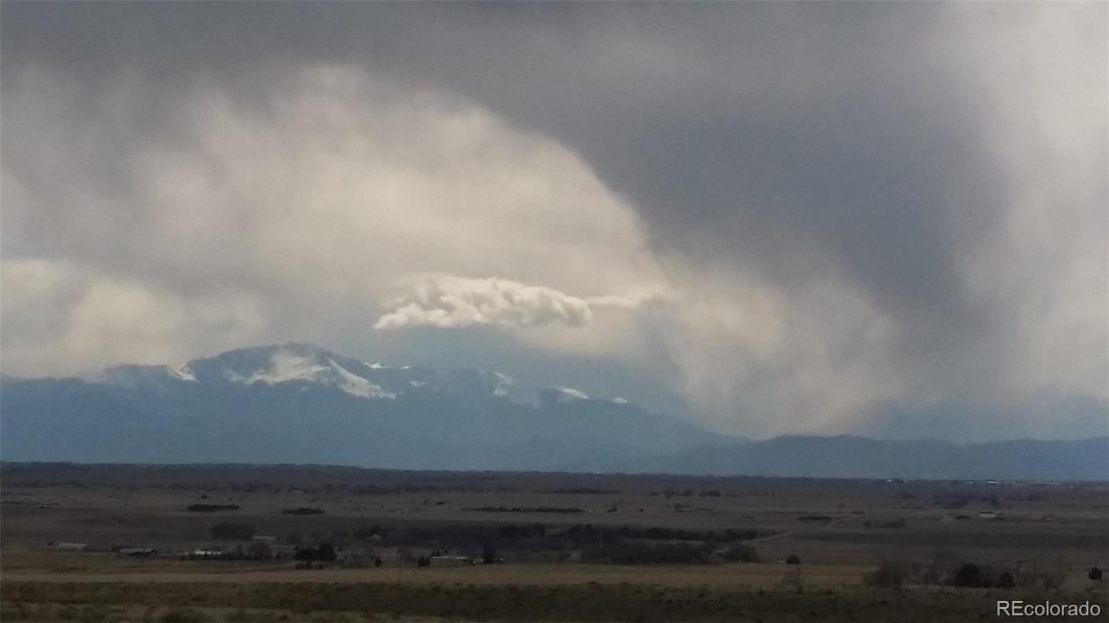 25800 Judge Orr Road Calhan, CO 80808 - Photo 10 of 18 a view of an ocean in between of the road