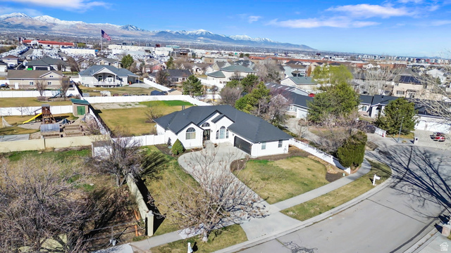 13176 Day Court Draper, UT 84020 - Photo 40 of 45 Aerial perspective of suburban area with a mountain backdrop