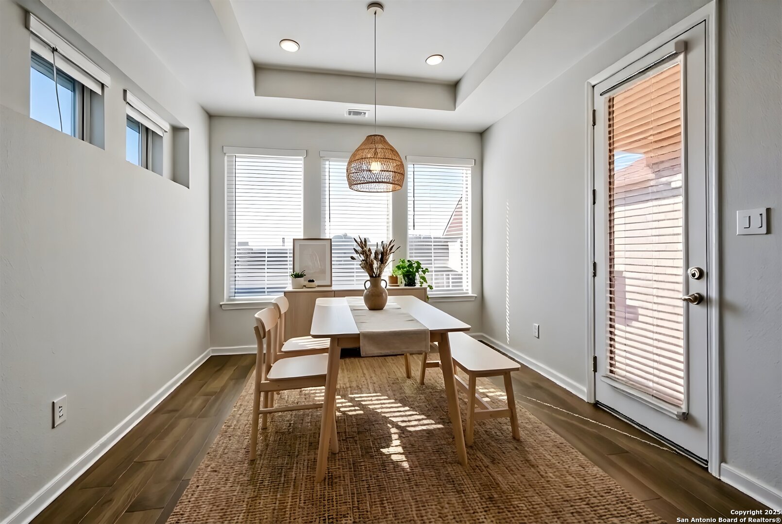 1718 Wind River San Antonio, TX 78258 - Photo 16 of 32 a workspace with wooden floor and windows