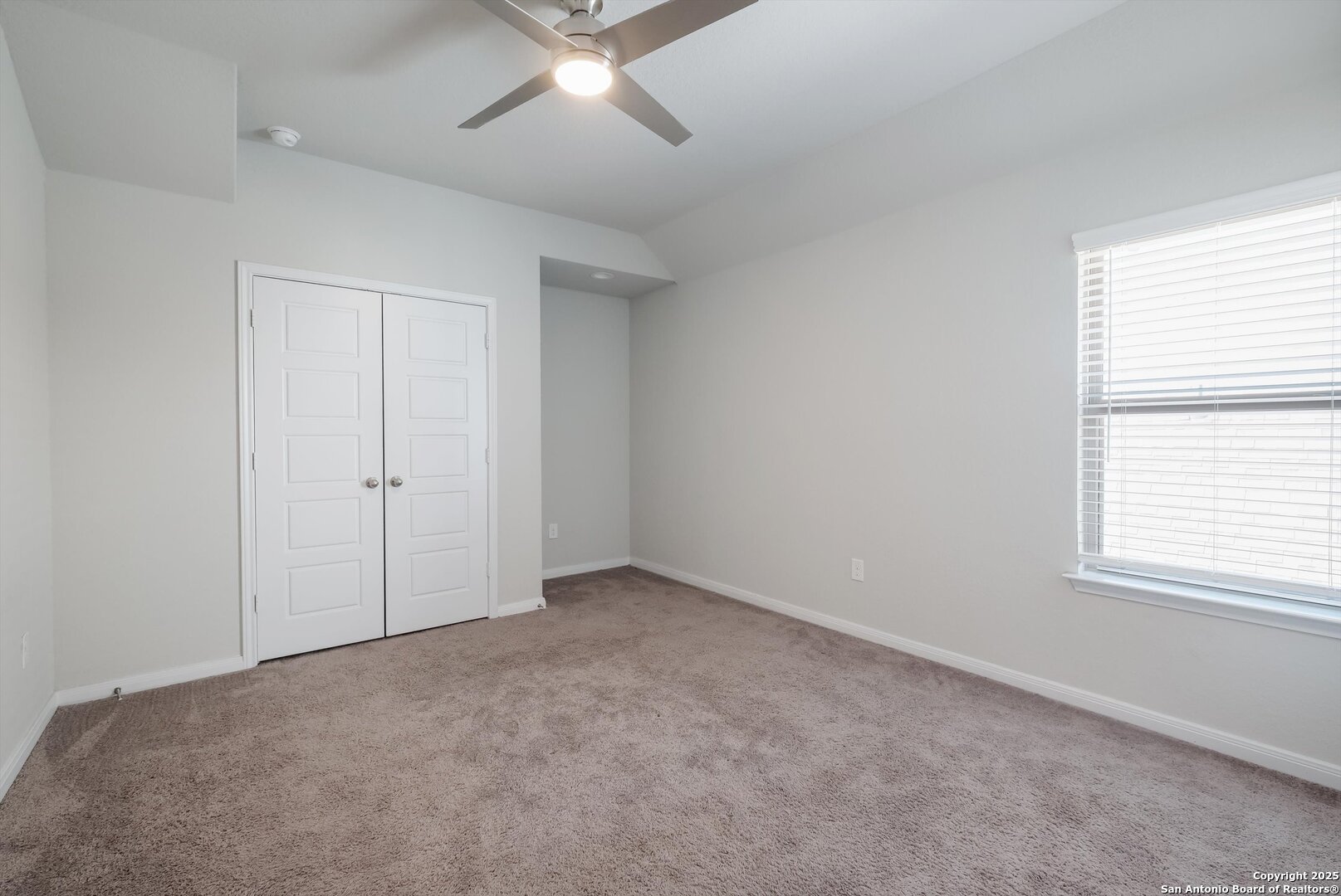 1718 Wind River San Antonio, TX 78258 - Photo 23 of 32 an empty room with a window