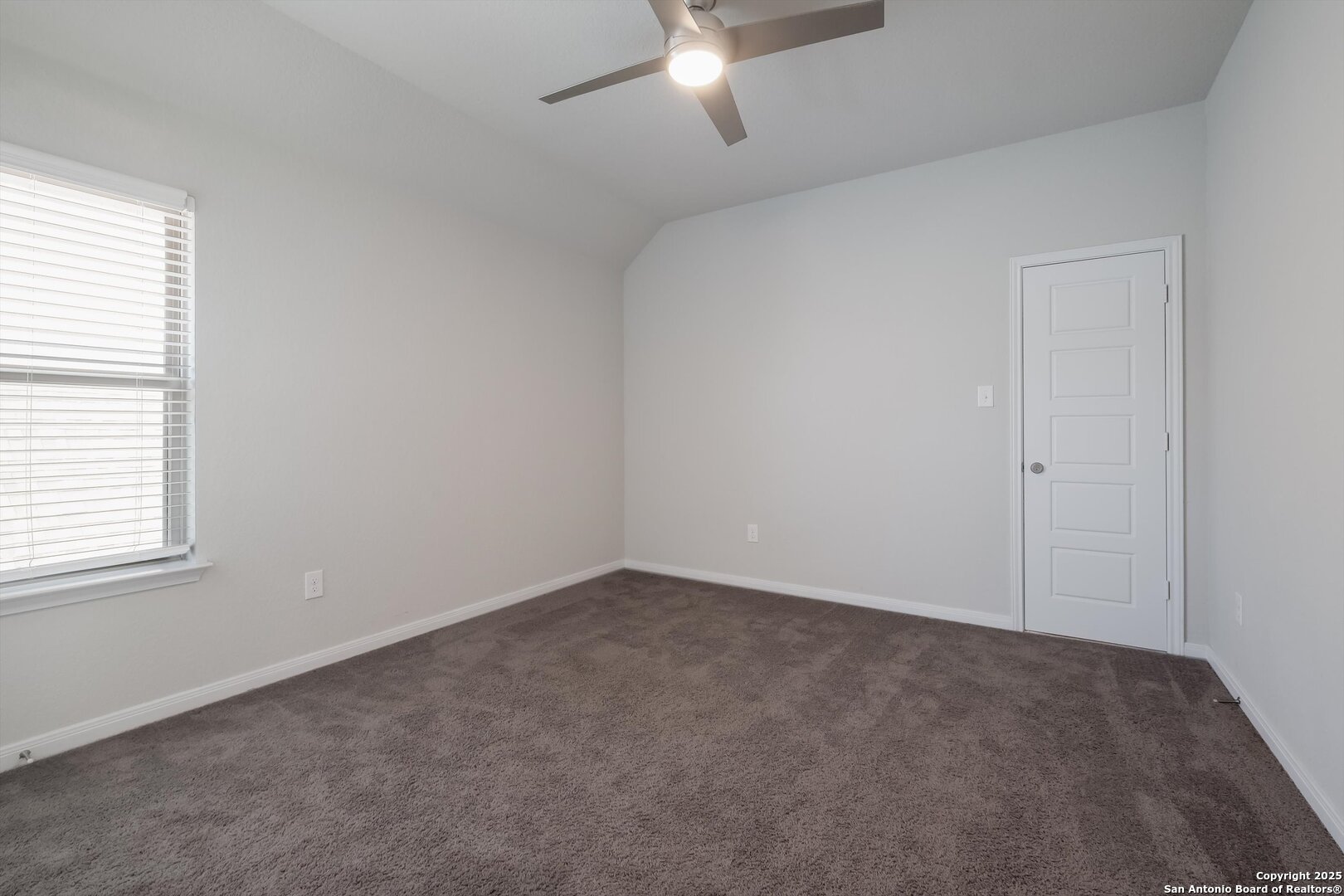 1718 Wind River San Antonio, TX 78258 - Photo 25 of 32 an empty room with a window