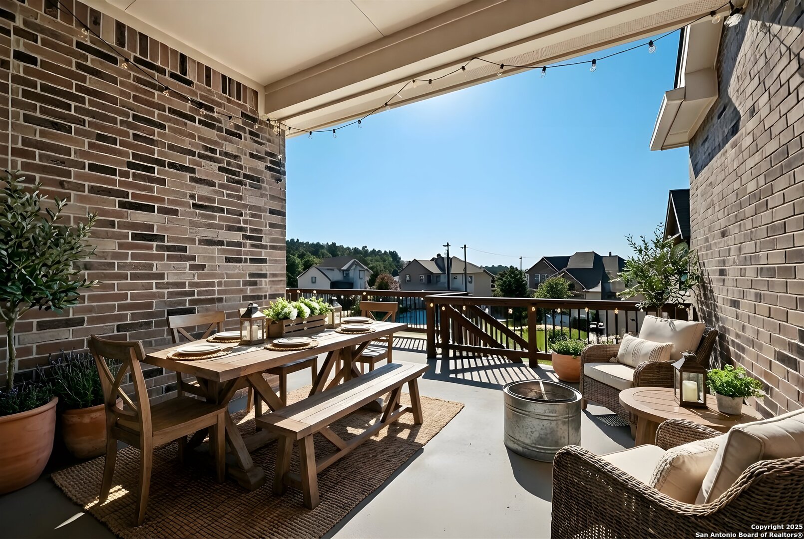 1718 Wind River San Antonio, TX 78258 - Photo 27 of 32 a balcony with furniture and city view