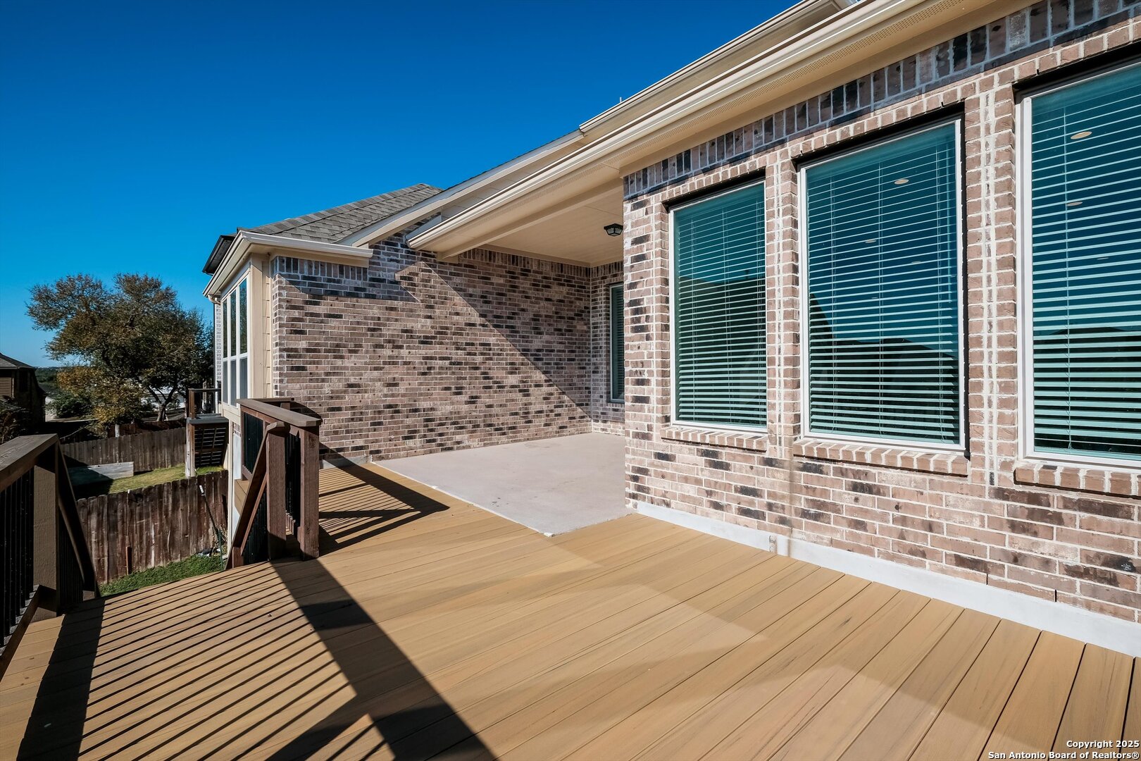 1718 Wind River San Antonio, TX 78258 - Photo 29 of 32 a view of balcony with wooden floor and outdoor space