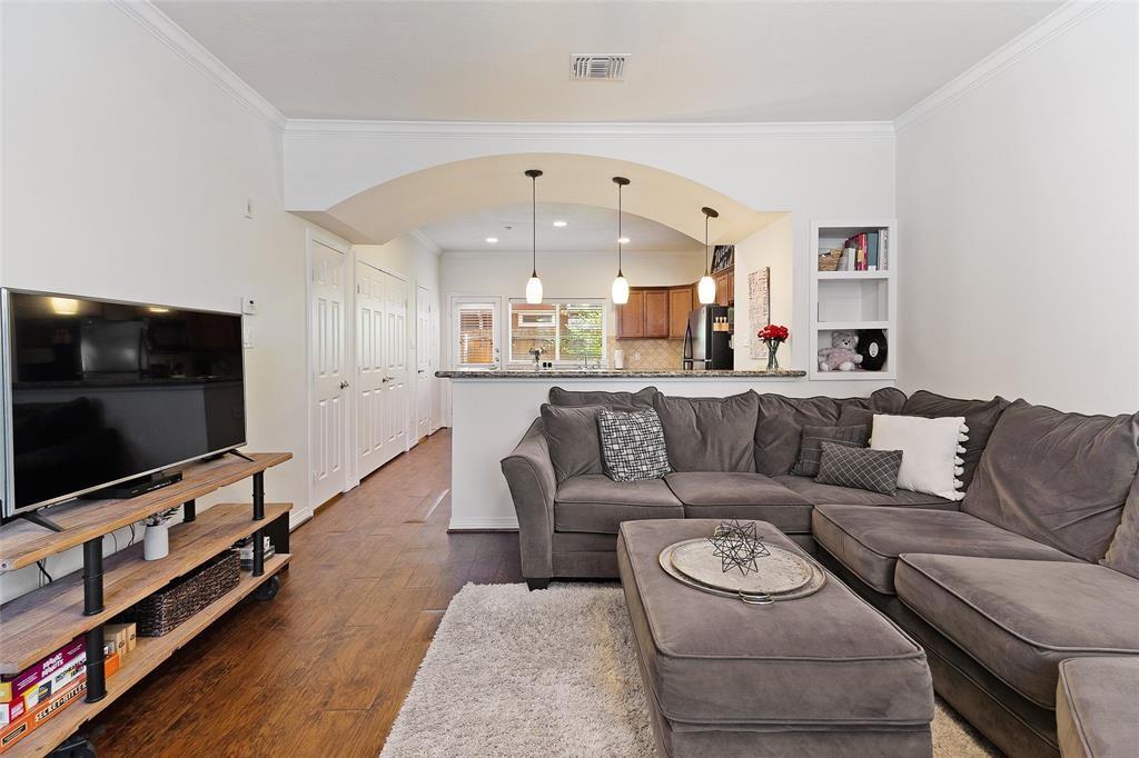 1198 Jones-Butler Road, Unit 2708 College Station, TX 77840 - Photo 2 of 22 a living room with furniture and a flat screen tv
