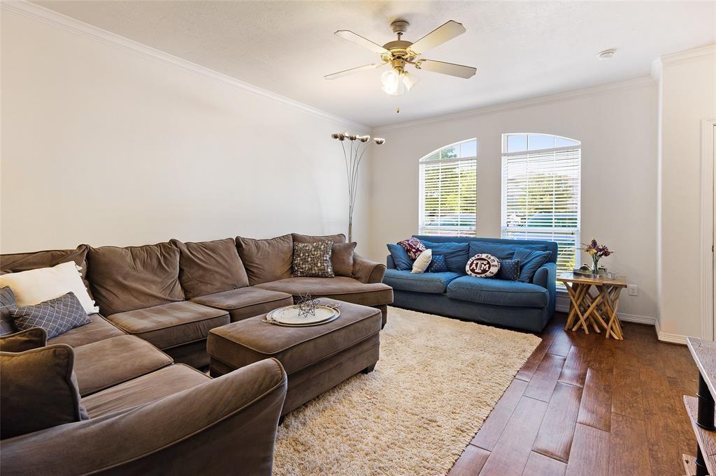 1198 Jones-Butler Road, Unit 2708 College Station, TX 77840 - Photo 3 of 22 a living room with furniture and a chandelier