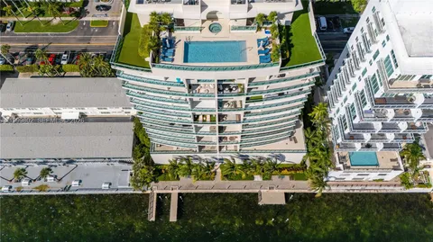 a bathroom with a double vanity sink mirror and double